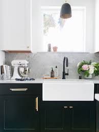 See how a tuxedo paint job can brighten and open up the room. A Black And White Kitchen Remodel In Seattle Architectural Digest