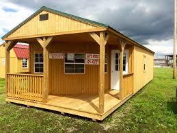 Doors can be placed on the gable (as in this photo) or on the side of the portable shed you purchase. 14x40 Deluxe Cabin Repo Cotton State Barns Of Tuscumbia Facebook