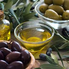 Olive Oil And Olives On Wood Background Tanning Oil Recipe Diy Tanning Oil Diy Tanning