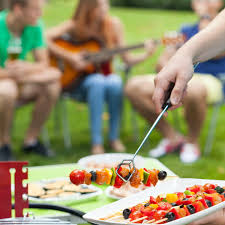 Setting the mood for a summer cookout. 11 Backyard Barbecue Party Tips To Impress Your Guests Without Stress Travelmamas Com