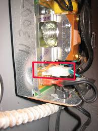There seems to be a button on the aquastat that is part of a switching relay? Issues With Replacement Of Honeywell L8148e Aquastat Heating Help The Wall