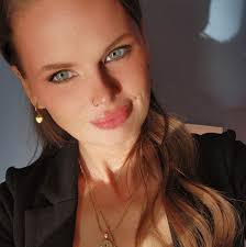 A Pataskala woman is now charged with "animals at large" after authorities  say her neighbor was allegedly mauled to death by her pigs