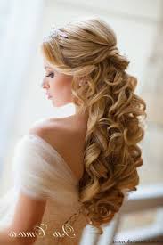 Wear hair long and flowy for a whimsical quinceañera hairstyle that will impress. Wedding Hairstyles Down Long Hair Hairstyles Vip
