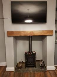 Oak Beam Fireplaces Cheapest Mantels In The Uk Planed And Sanded Celtic Timber In 2020 Oak Beam Fireplace Cosy Living Room Living Room Designs