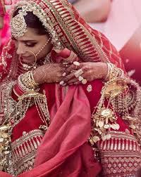It Was Worth The Wait The First Official Photos Of Deepveer Wedding Are Finally Out Wedmegood Bridal Lehenga Red Bollywood Wedding Indian Bride Outfits