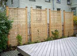 The dappled sunlight created by the overhead latticework creates a cool, relaxing environment perfect for backyard entertaining—like standing in the shade of a tree on a hot summer day. 59 Diy Backyard Privacy Fence Ideas On A Budget Roundecor Privacy Fence Designs Backyard Privacy Backyard Fences