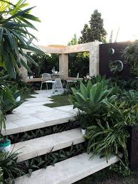 Foxtail Agaves Or Agave Attenuata Blend With The Rest Of A Subtropical Gardend By Vi Small Backyard Garden Design Backyard Garden Design Modern Outdoor Spaces