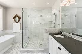 This beautiful bathroom features cement tiles (from cement tile shop) on the floors with an infinity drain a custom frameless shower door and custom lighting. Blog Trendy Bathroom Floor Tiles Ideas