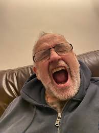 My Granddaughter Amelia was messing with my phone and captured me in full  yawn!🤣