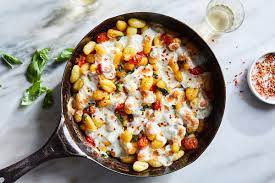 Crispy Gnocchi With Burst Tomatoes And Mozzarella Recipe Recipe In 2021 Mozzarella Recipes Nyt Cooking Gnocchi