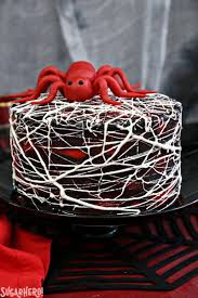 The legend of the christmas spider is the story of a poor but hardworking widow and her children. Red Velvet Marshmallow Spiderweb Cake Classic Red Velvet Cake With Black Chocolate Buttercream Covered With A Web Spider Web Cake Spider Cake Red Velvet Cake