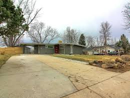 Mosby architects worked with the architect's original drawings of the home to create a new garage that matched and echoed the style of the home, from roof slope to brick color. Fully Remodeled Mid Century Modern Home In Englewood