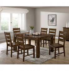 Contemporary interiors with a touch of 'glamour'. Mccall Rustic Walnut Dining Table