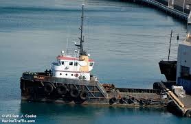 11 rescued after tug sinks off hawaii