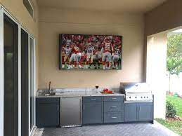 Cabinet refinishing revives dull or dinged up doors and drawers. Outdoor Kitchen With Shaker Cabinet Doors Custom Design Tampa