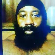 The Thick Black Bearded Man