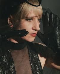 Veiled in grief, armed with vengeance. 🖤⚔️ Draped in midnight lace, she  stands at the grave, a silent storm beneath mourning silks. Love lost,  justice awaits. The whispers of the dead echo