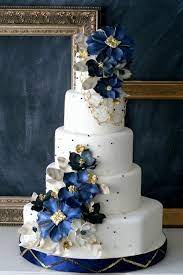 25 Delightful Wedding Cakes With Cascading Florals Gold Wedding Cake Wedding Cake Pictures Navy Blue Wedding Cakes