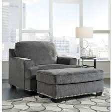 This sleek and stylish extra wide and deep lounge or living room chair is stun. Benchcraft By Ashley Locklin Transitional Chair And A Half With Ottoman A1 Furniture Mattress Chair Ottoman Sets