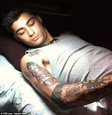 The celebrity couple was spotted out at the teen choice awards and omg! Has Zayn Malik Had His Tattoo Of His Ex Girlfriend Perrie Edwards Removed