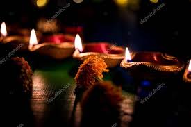 diwali diya lighting night gifts flowers moody background selective focus x201 ad night gifts lighting diwali ad i 2020
