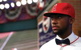 ANDRELTON “SIMBA” SIMMONS' PLAY HAS BEEN LOUD AND PROUD