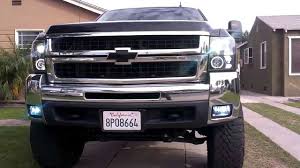 Each is constructed of chrome plated steel and fits under the edge of the headlamps' retaining ring. Aftermarket Headlights For Chevy Silverado Buyers Guide Ultimate Rides