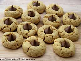 Peanut Butter Blossom Cookies Recipe Yummly Recipe Peanut Butter Blossom Cookies Peanut Butter Blossoms Recipe Yellow Cake Mix Cookies