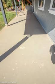 It's has been a month in a high traffic area and i love it so much i may not cover it up! How To Transform An Old Tired Cracked Concrete Patio The Happy Housie