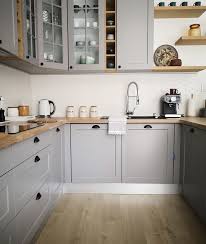 Hampton bay shaker satin white stock assembled wall kitchen cabinet (30 in. Kitchen Ikea Matte Tile Herringbone Backsplash Grey Cabinets Wood Countertops Modern Simp Wood Countertops Kitchen Contemporary Kitchen Cabinets Kitchen Design