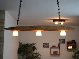 Hangelampen Hangelampe Aus Altem Holzbalken Inkl Leds Ein Designerstuck Von Aus Holz Mit Liebe Bei Dawanda Deckenlampe Holz Lampen Altholz Lampe