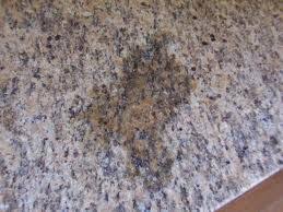 Vinegar will remove the spots from the aluminum bumper here's how! How To Remove Water Stains From Granite Countertops Hunker Cleaning Hacks Remove Water Stains Clean Dishwasher