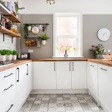 Will the tile kitchen last. Kitchen Makeover With Brick Island Grey Patterned Floor And White Units