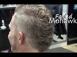 Over the years, punks have been testing out hair dye kits in the attempts to find the one color that is shocking, surprising, daring or a little bit different. Mens Mohawk Hairstyle Fade Haircut Video Clipper Cut On Blonde Curly Hair Mens Faded Mohawk Youtube