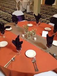 Burnt Orange Table Cloth With Burlap Runner And Plum Napkins In The Glasses Orange Tablecloths Fall Wedding Table Settings Wedding Decorations Table Settings