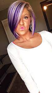 This look is understated and chic, allowing you to get in on the hair streaks trend without making too much of an out there statement with your strands. Purple Peekaboos On Blonde Hair Hair Styles Purple Hair Hair
