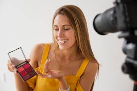 female ger filming makeup tutorial