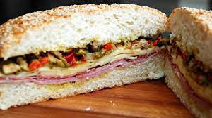 And bake 15 minutes or until loaf sounds hollow when tapped. Authentic New Orleans Muffuletta Recipe Youtube