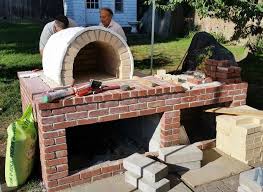 You only need refractory mortar and firebricks for the dome and floor of the oven. Wood Fired Brick Pizza Oven And Brick Bbq Grill Brick Oven Outdoor Brick Pizza Oven Outdoor Brick Pizza Oven