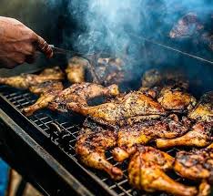 Jamaican Street Fare Live Fire Pan Chicken Butchered In Quarters Seasoned With A Regional Blend Of Herbs And Spices Then Pan Chicken Jamaican Recipes Chicken