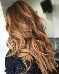 This look incorporates a blend of warm caramel, strawberry blonde, and honey blonde tones. Strawberry Blonde And Caramel Highlights Hair Styles Light Caramel Hair Hair Color Caramel