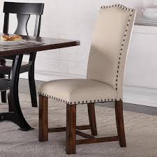 Practical and fashionable, the michele dining chair with nail head trim (set of 2), is a great addition to any dining room. Astor Upholstered Parson Chair With Nailhead Trim Carthage Furniture
