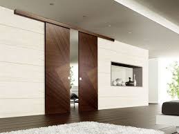 The sliding mirror door is a fantastic solution to a smaller space where there is no room for a traditional swinging door, and the primed surfaces are ready for any. Wooden Sliding Door Rio Canaletto Design Collection By Ghizzi Benatti Design Perusko Sartori Doors Interior Modern Door Design Interior Sliding Door Design