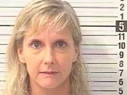 Woman gets 8 years for embezzling half a million