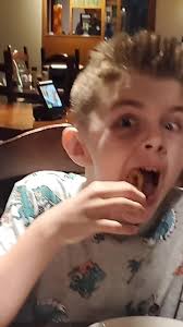 SQUID TASTES LIKE AN ONION RING🤔I DON'T THINK SO🤣NICE TRY  BOYS!😂#vacation #squid #seafood #fyp #food #funny #dinner #familyfun  #fried #tryit