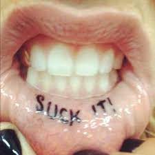Kesha S Tattoos Meanings Steal Her Style Inner Lip Tattoo Kesha Tattoos Mouth Tattoo