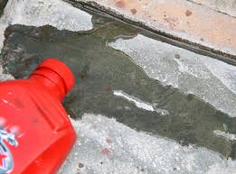 Oil stains on an asphalt driveway are unsightly, plus you may track oil into the house or the car. How To Remove Motor Oil From Concrete Driveway Remove Oil Stains Concrete Cleaner Cleaners Homemade