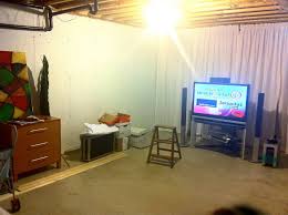 I am going to tell you how to frame your basement walls in a way that you will be able to float the i actually like the idea of the gap being at the top, because then the weight of the wall won't be hanging from the ceiling. Finished On The Cheap Using Dowel Hanging Wall Coverings To Provide A Sof Unfinished Basement Walls Unfinished Basement Decorating Basement Ceiling Ideas Cheap