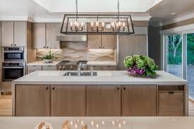 Oak cabinets and white quartz countertops go hand in hand to create a charming yet elegant look for your kitchen. Modern Oak Kitchen Designs Trendy Wood Finish In The Kitchen