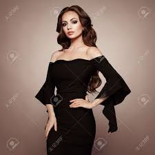 Hairstyles men classy short haircuts 33 super ideas black dresses classy classy dress trendy dresses Beautiful Woman In Elegant Black Evening Dress Brunette Girl With Long Healthy And Shiny Curly Hair Care And Beauty Beautiful Model Woman With Wavy Hairstyle Stock Photo Picture And Royalty Free Image
